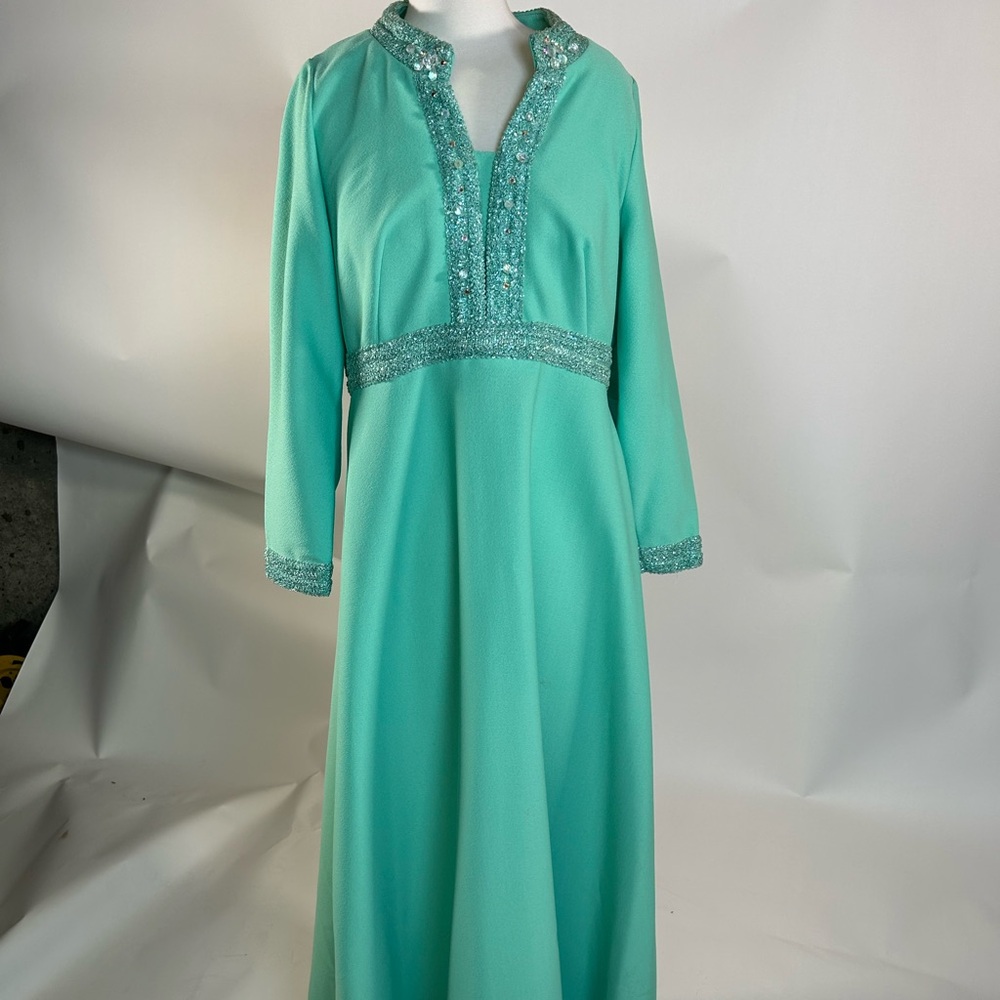 Late’60s/early ‘70s mint green maxi dress with bead trim.
